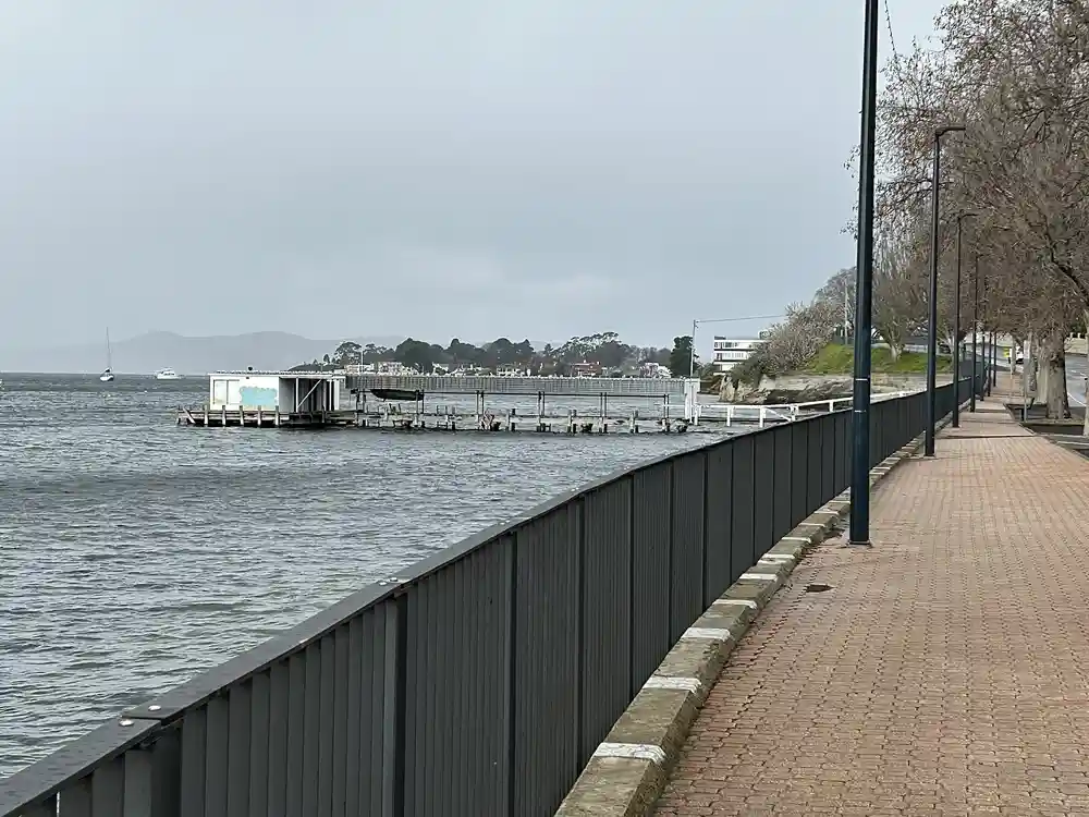 The waterside footpath along Sandy Bay Road near Lords Beach