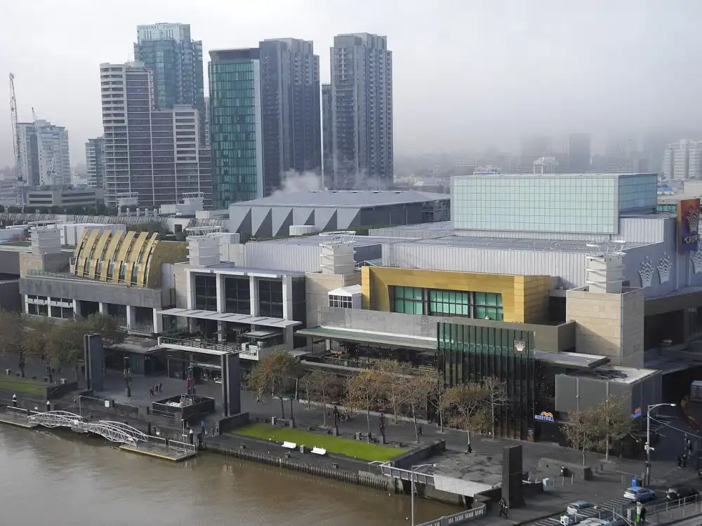 The Crown complex seen from above the Yarra River, with the riverside promenade in front