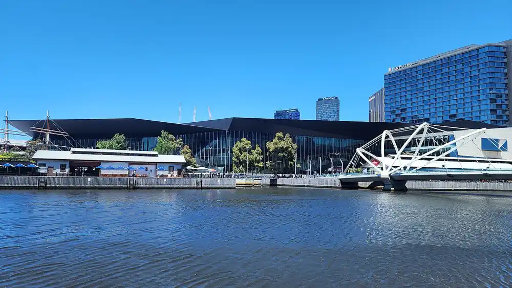 South Wharf seen across the Yarra River, with the Seafarers Bridge in front of the convention centre