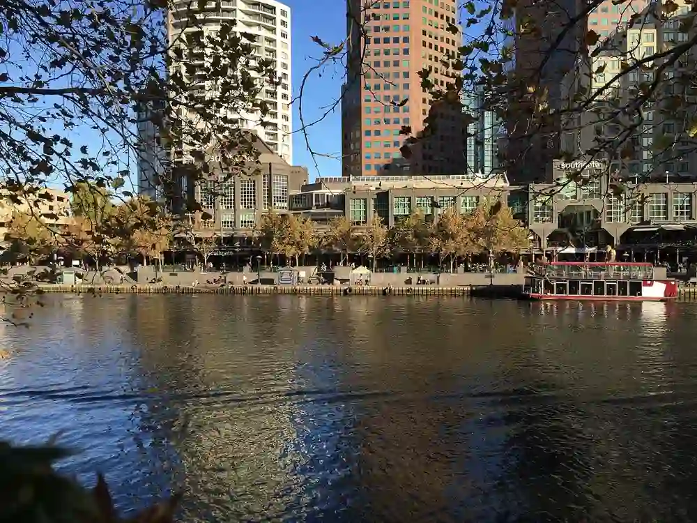 The Southbank riverfront and its towers seen across the Yarra River